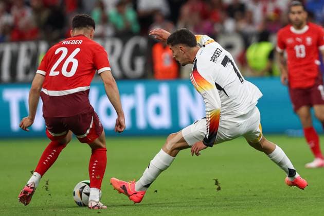 Fabian Rieder Switzerland and Kai Havertz Germany in a duel, UEFA EURO 2024 Group A, Switzerland vs Germany, Arena Frankfurt on June 23, 2024 in Frankfurt am Main, Germany Photo by Oliver Kaelke DeFodi Images Fabian Rieder Switzerland and Kai Havertz Germany battle for the ball, UEFA EURO 2024 Group A, Switzerland vs Germany, Arena Frankfurt on June 23, 2024 in Frankfurt am Main, Germany Photo by Oliver Kaelke DeFodi Images Defodi 678 2024 06 23 OK SUIGER 0764 Defodi-678