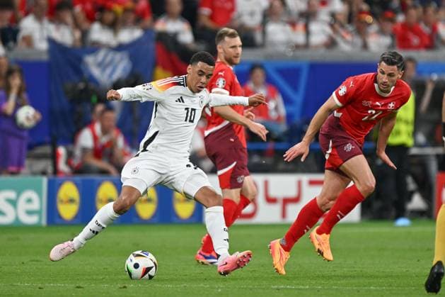 23 06 2024, xscotx, European Football Championship 2024, Switzerland Germany, emspor, v l Jamal Musiala Germany, 10 , Fabian Schaer Switzerland, 22 duel, duel, fight, tackle Frankfurt am Main