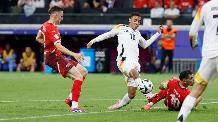 23 06 2024, Football, Euro 2024, Preliminary round, Switzerland - Germany, GER, Frankfurt, Stadium Picture from left Michel Aebischer Switzerland, 20 , Jamal Musiala Germany, 10 and Granit Xhaka Switzerland, 10 , Copyright: HMBxMedia xHeikoxBecker