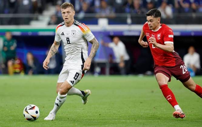 23 06 2024, Football, Euro 2024, Preliminary round, Switzerland - Germany, GER, Frankfurt, Stadium picture from left Toni Kroos Germany, 8 and Fabian Rieder Switzerland, 26 , Copyright: HMBxMedia xHeikoxBecker