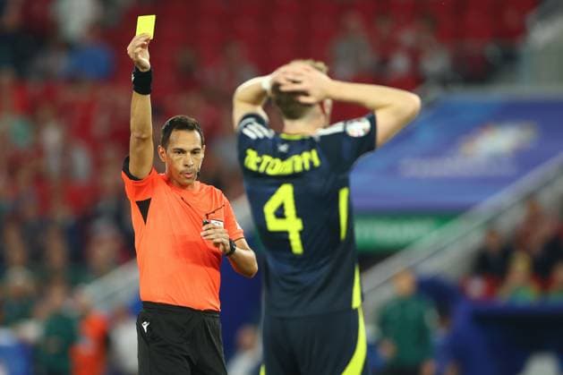Referee Facundo Tello gives Scott McTominay of Scotland a yellow card Scotland v Hungary, UEFA European Championship, EM, Europameisterschaft 2024, Group A, Football, Stuttgart Arena, Stuttgart, Germany, 23 Jun 2024 EDITORIAL USE ONLY No use with unauthorised audio, video, data, fixture lists, club league logos or live services. Online in-match use limited to 120 images, no video emulation. No use in betting, games or single club league player publications. Copyright: xKieranxMcManus Shutterstockx 14548072ax
