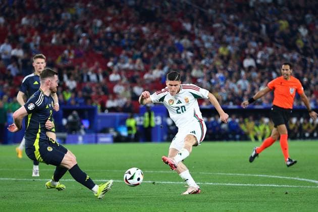 Roland Sallai of Hungary takes a shot at goal but fails to score Scotland v Hungary, UEFA European Championship, EM, Europameisterschaft 2024, Group A, Football, Stuttgart Arena, Stuttgart, Germany, 23 Jun 2024 EDITORIAL USE ONLY No use with unauthorised audio, video, data, fixture lists, club league logos or live services. Online in-match use limited to 120 images, no video emulation. No use in betting, games or single club league player publications. Copyright: xMichaelxZemanek Shutterstockx 14548075au