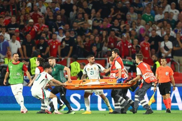 Dominik Szoboszlai of Hungary helps medical staff rush to injured Barnabas Varga of Hungary with a stretcher Scotland v Hungary, UEFA European Championship, EM, Europameisterschaft 2024, Group A, Football, Stuttgart Arena, Stuttgart, Germany, 23 Jun 2024 EDITORIAL USE ONLY No use with unauthorised audio, video, data, fixture lists, club league logos or live services. Online in-match use limited to 120 images, no video emulation. No use in betting, games or single club league player publications. Copyright: xKieranxMcManus Shutterstockx 14548072bh