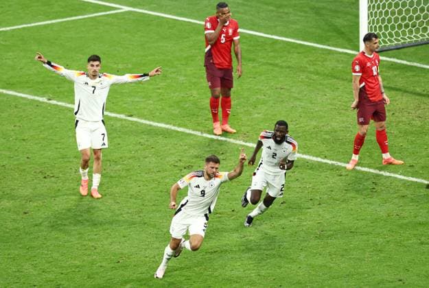 Niclas Füllkrug of Germany scores to make it 1-1 and celebrates Switzerland v Germany, UEFA European Championship, EM, Europameisterschaft 2024, Group A, Football, Frankfurt Arena, Frankfurt am Main, Germany, 23 Jun 2024 EDITORIAL USE ONLY No use with unauthorised audio, video, data, fixture lists, club league logos or live services. Online in-match use limited to 120 images, no video emulation. No use in betting, games or single club league player publications. Copyright: xMattxWest Shutterstockx 14548071cv