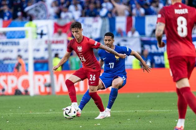 GER, Euro 2024, Group D, France FRA vs Poland POL 25 06 2024, Signal Iduna Park BVB Stadion Dortmund, Dortmund, GER, Euro 2024, Group D, France FRA vs Poland POL In the picture duel between Urbanski Kacper Poland Poland POL, 26 and Saliba William France FRA, 17 nordphotoxGmbHxx xChristianxSchulze nph000300