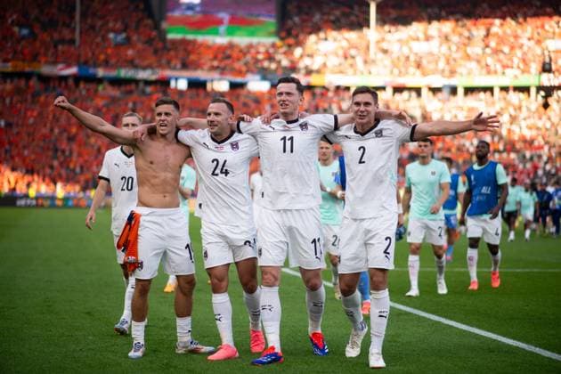 Christoph Baumgartner Austria, 19 , Andreas Weimann Austria, 24 , Michael Gregoritsch Austria, 11 , Maximilian Woeber Austria, 02 celebrates the victory and entry into the round of 16 as group winner, GER, Netherlands NED vs Austria AUT , European Football Championship, UEFA EURO 2024, Group D, Matchday 3, 25 06 2024 GER, Netherlands NED vs Austria AUT , European Football Championship, UEFA EURO 2024, Group D, Matchday 3, 25 06 2024 Berlin Copyright: xEibner-Pressefoto Memmlerx EP_MMR
