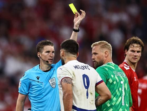 Aleksandar Mitrovic of Serbia is shown a yellow card Denmark v Serbia, UEFA European Championship, EM, Europameisterschaft 2024, Group C, Football, Munich Football Arena, Munich, Germany, 25 Jun 2024 EDITORIAL USE ONLY No use with unauthorised audio, video, data, fixture lists, club league logos or live services. Online in-match use limited to 120 images, no video emulation. No use in betting, games or single club league player publications. Copyright: xMichaelxZemanek Shutterstockx 14555536cu