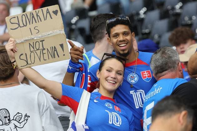 Slovakia is not Slovenia fan poster, female Slovak fan, female fan, football fan, Slovakia supporter, Slovakia fan, preliminary round match M33, SVK ROU, Group E, European Football Championship, Slovakia vs Romania, European Football Championship, Slovakia vs Romania, Frankfurt, 26 06 2024,