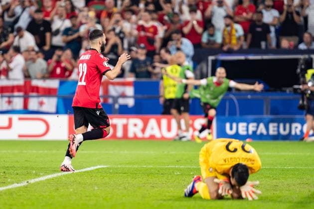 GER, Euro 2024, Group F, Georgia GEO vs. Portugal PRT 26 06 2024, Veltins Arena Arena AufSchalke , Gelsenkirchen, GER, Euro 2024, Group F, Georgia GEO vs. Portugal PRT In the picture Goal celebrations cheering over the goal to 2 0 by Mikautadze Georges Georgia Georgia GEO, 22 Diogo Costa Portugal PRT, 22 lies on the ground, gestures, facial expressions, emotions nordphotoxGmbHxx xChristianxSchulze nph000300