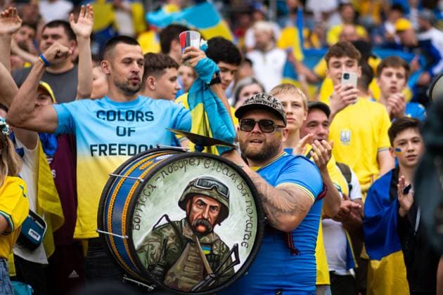 Fans of Ukraine with drum with soldier, GER, Ukraine UKR vs Belgium BEL , European Football Championship, UEFA EURO 2024, Group E, Matchday 3, 26 06 2024 GER, Ukraine UKR vs Belgium BEL , European Football Championship, UEFA EURO 2024, Group E, Matchday 3, 26 06 2024 Stuttgart Copyright: xEibner-Pressefoto Memmlerx EP_MMR