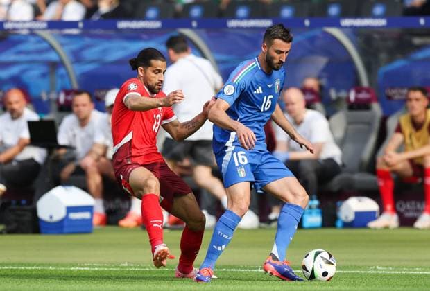 Ricardo Rodriguez of Switzerland and Bryan Cristante of Italy Switzerland v Italy, UEFA European Championship, EM, Europameisterschaft 2024, Round of 16, Football, Olympiastadion, Berlin, Germany - 29 Jun 2024 EDITORIAL USE ONLY No use with unauthorised audio, video, data, fixture lists, club league logos or live services. Online in-match use limited to 120 images, no video emulation. No use in betting, games or single club league player publications. Copyright: xPaulxCurrie Shutterstockx 14562043ac