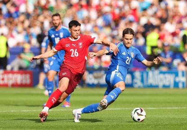 Fabian Rieder of Switzerland chases Nicolo Fagioli of Italy Switzerland v Italy, UEFA European Championship, EM, Europameisterschaft 2024, Round of 16, Football, Olympiastadion, Berlin, Germany - 29 Jun 2024 EDITORIAL USE ONLY No use with unauthorised audio, video, data, fixture lists, club league logos or live services. Online in-match use limited to 120 images, no video emulation. No use in betting, games or single club league player publications. Copyright: xPaulxCurrie Shutterstockx 14562043ao