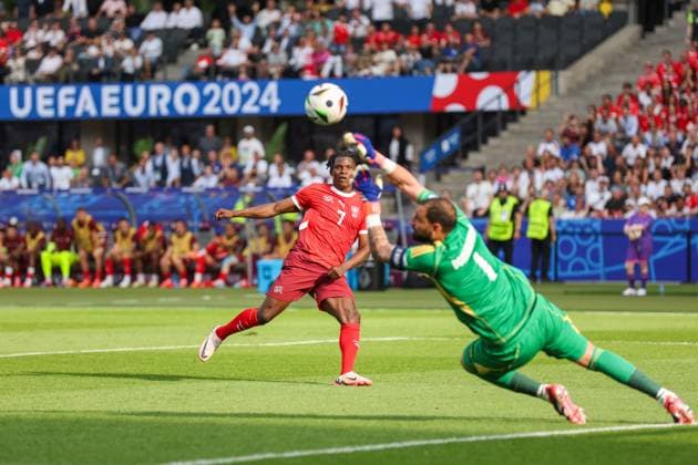Goalkeeper Gianluigi Donnarumma of Italy saves from Breel Embolo of Switzerland Switzerland v Italy, UEFA European Championship, EM, Europameisterschaft 2024, Round of 16, Football, Olympiastadion, Berlin, Germany - 29 Jun 2024 EDITORIAL USE ONLY No use with unauthorised audio, video, data, fixture lists, club league logos or live services. Online in-match use limited to 120 images, no video emulation. No use in betting, games or single club league player publications. Copyright: xPaulxCurrie Shutterstockx 14562043ar