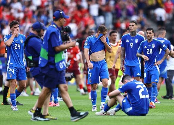 Alessandro Bastoni and Davide Frattesi of Italy look dejected at the end of the game Switzerland v Italy, UEFA European Championship, EM, Europameisterschaft 2024, Round of 16, Football, Olympiastadion, Berlin, Germany - 29 Jun 2024 EDITORIAL USE ONLY No use with unauthorised audio, video, data, fixture lists, club league logos or live services. Online in-match use limited to 120 images, no video emulation. No use in betting, games or single club league player publications. Copyright: xMichaelxZemanek Shutterstockx 14562039bx