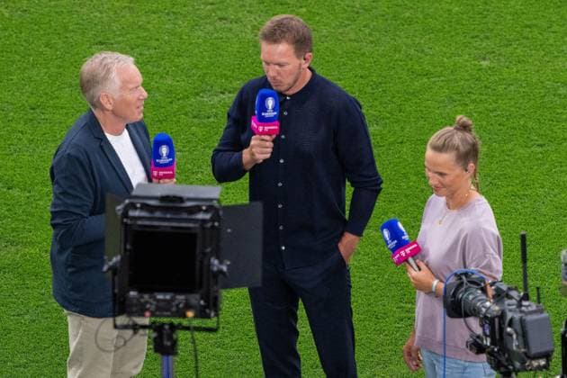 GER, EURO 2024, Round of 16, Germany GER vs Denmark DEN 29 06 2024, BVB Stadium Dortmund, Dortmund, GER, EURO 2024, Round of 16, Germany GER vs Denmark DEN In the picture Julian Nagelsmann Germany GER, Head Coach in an interview with Johannes B Kerner and Tabea Kemme, Interview Microphone Press conference Gestures, facial expressions, emotions nordphotoxGmbHxx xDenkinger nph00015