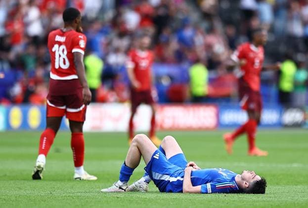 Alessandro Bastoni of Italy reacts after the match Switzerland v Italy, UEFA European Championship, EM, Europameisterschaft 2024, Round of 16, Football, Olympiastadion, Berlin, Germany - 29 Jun 2024 EDITORIAL USE ONLY No use with unauthorised audio, video, data, fixture lists, club league logos or live services. Online in-match use limited to 120 images, no video emulation. No use in betting, games or single club league player publications. Copyright: xMichaelxZemanek Shutterstockx 14562039fi