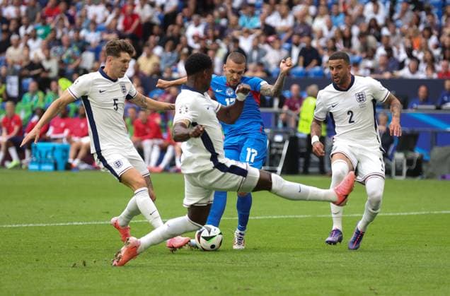 EURO 2024, England - Slowakei Lukas Haraslin of Slovakia has his shot blocked by Marc Guà hi of England England v Slovakia, UEFA European Championship, EM, Europameisterschaft 2024, Round of 16, Football, Arena AufSchalke, Gelsenkirchen, Germany - 30 Jun 2024 EDITORIAL USE ONLY No use with unauthorised audio, video, data, fixture lists, club league logos or live services. Online in-match use limited to 120 images, no video emulation. No use in betting, games or single club league player publications. Copyright: xPaulxCurrie Shutterstockx 14562219ba
