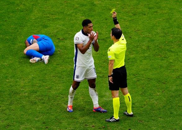 EURO 2024, England - Slowakei Jude Bellingham of England reacts to receiving a yellow card England v Slovakia, UEFA European Championship, EM, Europameisterschaft 2024, Round of 16, Football, Arena AufSchalke, Gelsenkirchen, Germany - 30 Jun 2024 EDITORIAL USE ONLY No use with unauthorised audio, video, data, fixture lists, club league logos or live services. Online in-match use limited to 120 images, no video emulation. No use in betting, games or single club league player publications. Copyright: xDavexShopland Shutterstockx 14562222ao