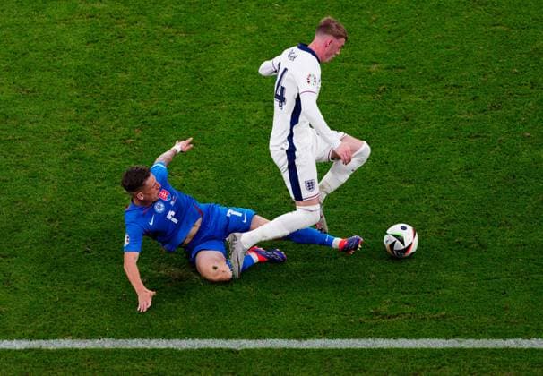 Cole Palmer of England is challenged by Tomas Suslov of Slovakia England v Slovakia, UEFA European Championship, EM, Europameisterschaft 2024, Round of 16, Football, Arena AufSchalke, Gelsenkirchen, Germany - 30 Jun 2024 EDITORIAL USE ONLY No use with unauthorised audio, video, data, fixture lists, club league logos or live services. Online in-match use limited to 120 images, no video emulation. No use in betting, games or single club league player publications. Copyright: xDavexShopland Shutterstockx 14562222dv