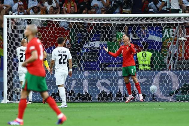 Cristiano Ronaldo of Portugal reacts Portugal v Slovenia, UEFA European Championship, EM, Europameisterschaft 2024, Round of 16, Football, Frankfurt Arena, Frankfurt, Germany - 01 Jul 2024 EDITORIAL USE ONLY No use with unauthorised audio, video, data, fixture lists, club league logos or live services. Online in-match use limited to 120 images, no video emulation. No use in betting, games or single club league player publications. Copyright: xMichaelxZemanek Shutterstockx 14566640ag