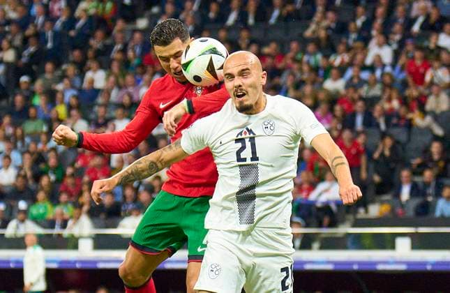 Cristiano RONALDO, Por 7 compete for the ball, tackling, duel, header, zweikampf, action, fight against Vanja Drusic, SVN 21 in the best of 16 match PORTUGAL - SLOVENIA of the UEFA European Championships 2024 on Jul 01, 2024 in Frankfurt, Germany.