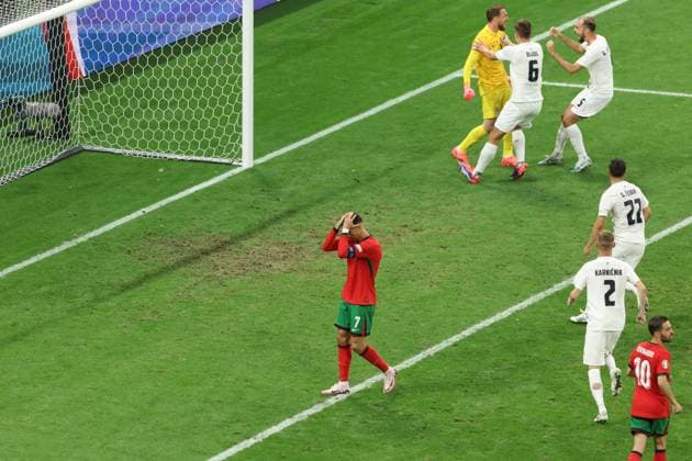 Cristiano Ronaldo of Portugal reacts to missing a penalty kick Portugal v Slovenia, UEFA European Championship, EM, Europameisterschaft 2024, Round of 16, Football, Frankfurt Arena, Frankfurt, Germany - 01 Jul 2024 EDITORIAL USE ONLY No use with unauthorised audio, video, data, fixture lists, club league logos or live services. Online in-match use limited to 120 images, no video emulation. No use in betting, games or single club league player publications. Copyright: xPaulxCurrie Shutterstockx 14566636ce