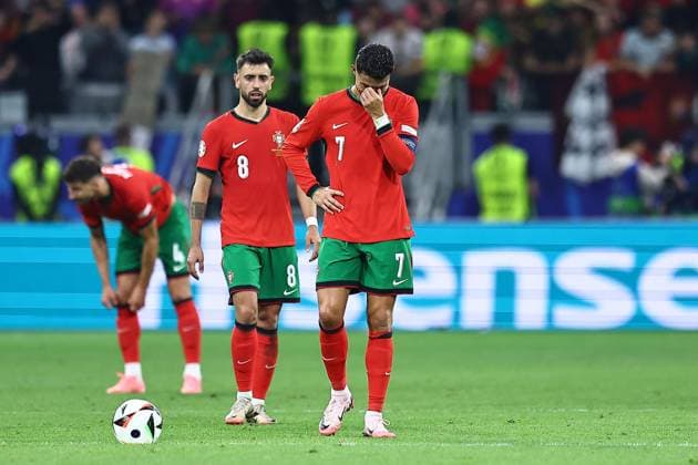 An emotional and dejected Cristiano Ronaldo of Portugal Portugal v Slovenia, UEFA European Championship, EM, Europameisterschaft 2024, Round of 16, Football, Frankfurt Arena, Frankfurt, Germany - 01 Jul 2024 EDITORIAL USE ONLY No use with unauthorised audio, video, data, fixture lists, club league logos or live services. Online in-match use limited to 120 images, no video emulation. No use in betting, games or single club league player publications. Copyright: xMichaelxZemanek Shutterstockx 14566640cp