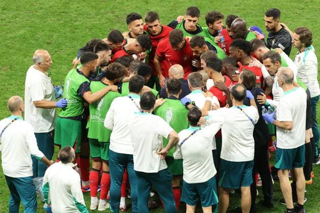 An emotional and dejected Cristiano Ronaldo of Portugal during the extra time half time huddle Portugal v Slovenia, UEFA European Championship, EM, Europameisterschaft 2024, Round of 16, Football, Frankfurt Arena, Frankfurt, Germany - 01 Jul 2024 EDITORIAL USE ONLY No use with unauthorised audio, video, data, fixture lists, club league logos or live services. Online in-match use limited to 120 images, no video emulation. No use in betting, games or single club league player publications. Copyright: xPaulxCurrie Shutterstockx 14566636ct