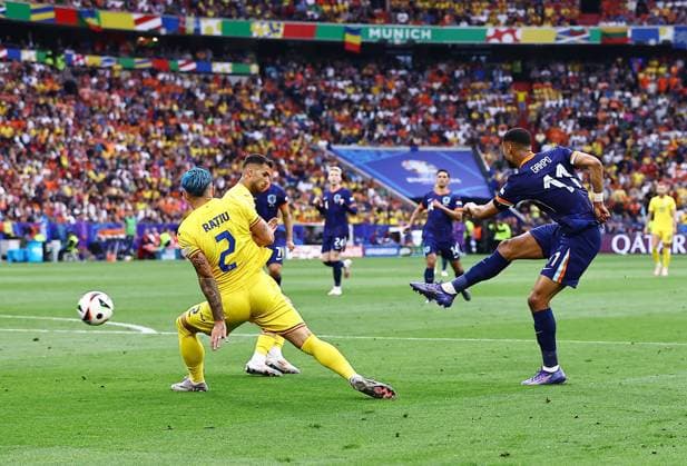 Cody Gakpo of Netherlands scores to make it 0-1 Romania v Netherlands, UEFA European Championship, EM, Europameisterschaft 2024, Round of 16, Football, Munich Football Arena, Munich, Germany - 02 Jul 2024 EDITORIAL USE ONLY No use with unauthorised audio, video, data, fixture lists, club league logos or live services. Online in-match use limited to 120 images, no video emulation. No use in betting, games or single club league player publications. Copyright: xMichaelxZemanek Shutterstockx 14566637aj