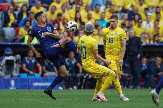 in duel, action, with Tijjani Reijnders 14 Netherlands , Ianis Hagi 10 Romania , Razvan Marin 18 Romania , Romania vs Netherlands, Football, UEFA Euro 2024, Round of 16, M43, 02 07 2024 Munich Bavaria Germany Copyright: xkolbert-press ChristianxKolbertx