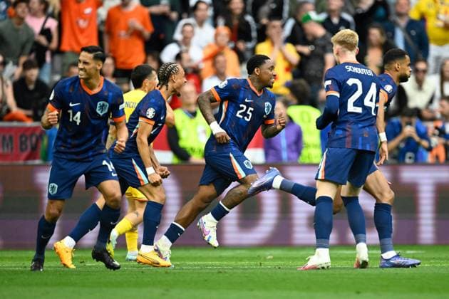 Picture shows Goal for the Netherlands, Goal celebration Netherlands, Tijjani Reijnders 14, Netherlands , Steven Bergwijn 25, Netherlands , Cody Gakpo 11, Netherlands , Jerdy Schouten 24, Netherlands , Disappointment at Romania, 02 07 2024, Munich, Football, European Championship, Romania Netherlands, EVENT REGULATIONS PROHIBIT ANY USE OF PHOTOGRAPHS AS IMAGE SEQUENCES AND OR QUASI VIDEO xklx