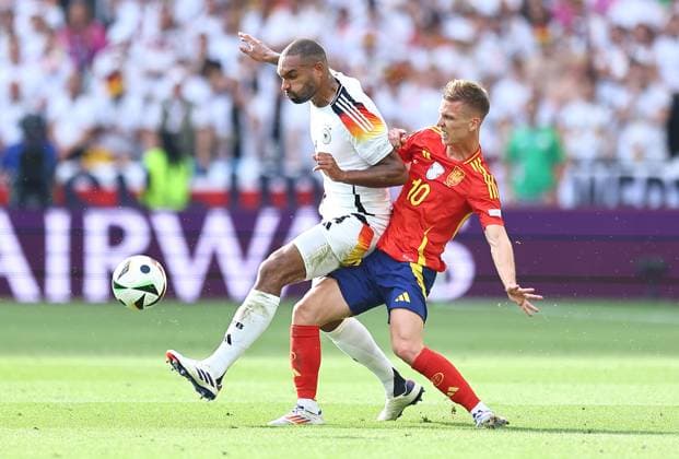 Jonathan Tah of Germany is challenged by Dani Olmo of Spain Spain v Germany, UEFA European Championship, EM, Europameisterschaft 2024, Quarter Final, Football, Stuttgart Arena, Stuttgart, Germany, 05 Jul 2024 EDITORIAL USE ONLY No use with unauthorised audio, video, data, fixture lists, club league logos or live services. Online in-match use limited to 120 images, no video emulation. No use in betting, games or single club league player publications. Copyright: xMichaelxZemanek Shutterstockx 14571380bi