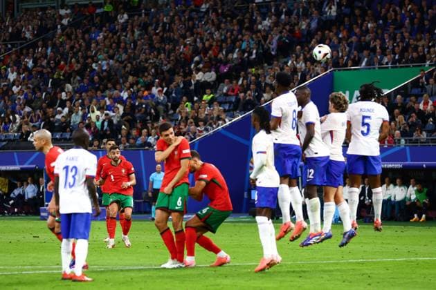 Bruno Fernandes of Portugal takes a free kick but fails to score Portugal v France, UEFA European Championship, EM, Europameisterschaft 2024, Quarter Final, Football, Volksparkstadion, Hamburg, Germany, 05 Jul 2024 EDITORIAL USE ONLY No use with unauthorised audio, video, data, fixture lists, club league logos or live services. Online in-match use limited to 120 images, no video emulation. No use in betting, games or single club league player publications. Copyright: xKieranxMcManus Shutterstockx 14571382ba