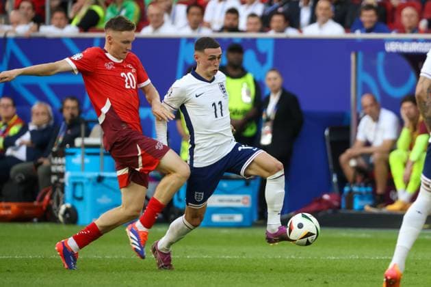 Michel Aebischer Switzerland, 20 and Phil Foden England, 11 , Football, UEFA , European Championship, Quarterfinals 2024, England vs Switzerland, 06 07 2024, Duesseldorf Arena, Duesseldorf, Germany Duesseldorf Duesseldorf Arena Nordrhein Westfalen Germany Copyright: xGrantxHubbsx