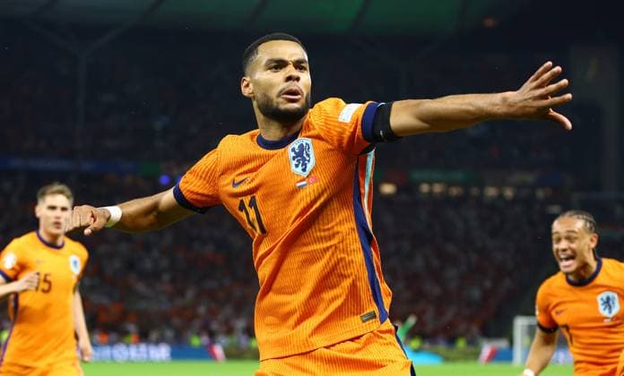 Cody Gakpo of Netherlands celebrates scoring the second goal 2-1 Netherlands v Turkiye, UEFA European Championship, EM, Europameisterschaft 2024, Quarter Final, Football, Olympiastadion, Berlin, Germany, 06 Jul 2024 EDITORIAL USE ONLY No use with unauthorised audio, video, data, fixture lists, club league logos or live services. Online in-match use limited to 120 images, no video emulation. No use in betting, games or single club league player publications. Copyright: xKieranxMcManus Shutterstockx 14571393cf