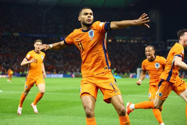Cody Gakpo of Netherlands celebrates scoring the second goal 2-1 Netherlands v Turkiye, UEFA European Championship, EM, Europameisterschaft 2024, Quarter Final, Football, Olympiastadion, Berlin, Germany, 06 Jul 2024 EDITORIAL USE ONLY No use with unauthorised audio, video, data, fixture lists, club league logos or live services. Online in-match use limited to 120 images, no video emulation. No use in betting, games or single club league player publications. Copyright: xKieranxMcManus Shutterstockx 14571393cb