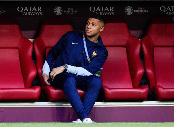 Kylian Mbappà of France sat on the bench during arrivals Spain v France, UEFA European Championship, EM, Europameisterschaft 2024, Semi Final, Football, Munich Football Arena, Munich, Germany - 09 Jul 2024 EDITORIAL USE ONLY No use with unauthorised audio, video, data, fixture lists, club league logos or live services. Online in-match use limited to 120 images, no video emulation. No use in betting, games or single club league player publications. Copyright: xDavexShopland Shutterstockx 14576888b
