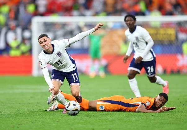 Phil Foden of England is challenged by Denzel Dumfries of Netherlands Netherlands v England, UEFA European Championship, EM, Europameisterschaft 2024, Semi Final, Football, BVB Stadion, Dortmund, Germany, 10 Jul 2024 EDITORIAL USE ONLY No use with unauthorised audio, video, data, fixture lists, club league logos or live services. Online in-match use limited to 120 images, no video emulation. No use in betting, games or single club league player publications. Copyright: xMichaelxZemanek Shutterstockx 14576899ca