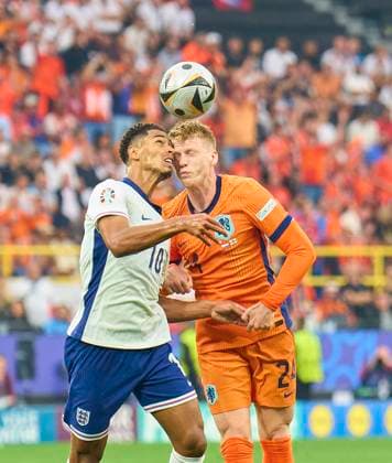 Jude Bellingham, ENG 10 compete for the ball, tackling, duel, header, zweikampf, action, fight against Jerdy Schouten, NL 24 crash in the semi final match NETHERLANDS - ENGLAND of the UEFA European Championships 2024 on Jul 10, 2024 in Dortmund, Germany.