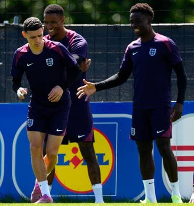 Phil Foden, Ezri Konsa and Bukayo Saka of England England Training, UEFA European Championship, EM, Europameisterschaft 2024, Final, Football, Spa & Golf Resort Weimarer Land, Blankenhain, Germany, 13 Jul 2024 EDITORIAL USE ONLY No use with unauthorised audio, video, data, fixture lists, club league logos or live services. Online in-match use limited to 120 images, no video emulation. No use in betting, games or single club league player publications. Copyright: xDavexShopland Shutterstockx 14583292al
