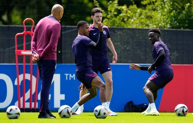 Ezri Konsa, Declan Rice and Bukayo Saka of England England Training, UEFA European Championship, EM, Europameisterschaft 2024, Final, Football, Spa & Golf Resort Weimarer Land, Blankenhain, Germany, 13 Jul 2024 EDITORIAL USE ONLY No use with unauthorised audio, video, data, fixture lists, club league logos or live services. Online in-match use limited to 120 images, no video emulation. No use in betting, games or single club league player publications. Copyright: xDavexShopland Shutterstockx 14583292bn