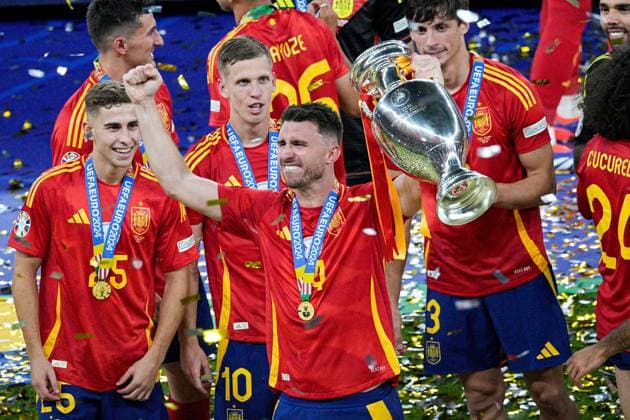 Aymeric Laporte of Spain lifts the 2024 UEFA European Football Championship trophy Spain v England, UEFA European Championship, EM, Europameisterschaft 2024, Final, Football, Olympiastadion, Berlin, Germany, 14 Jul 2024 EDITORIAL USE ONLY No use with unauthorised audio, video, data, fixture lists, club league logos or live services. Online in-match use limited to 120 images, no video emulation. No use in betting, games or single club league player publications. Copyright: xDavexShopland Shutterstockx 14583342fj