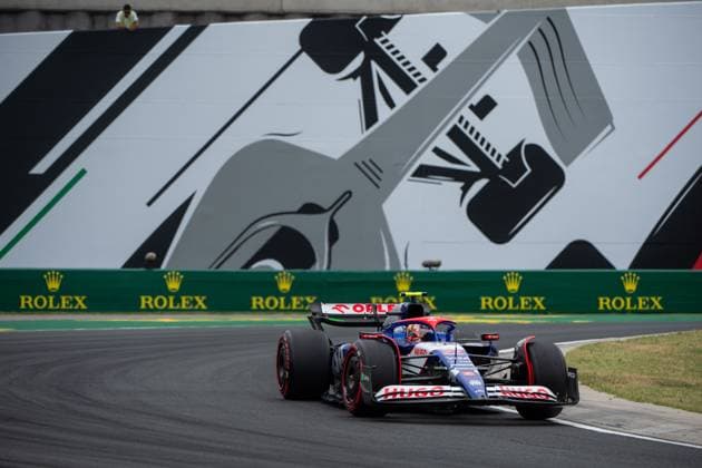 Yuki Tsunoda Visa Cash App RB Formula One Team Racing Bulls, Japan, 22 in VCARB 01 in front of a painting of a silver Formula 1 car and Rolex branding, HUN, Formula 1 World Championship, Hungarian Grand Prix, Hungaroring, Free Practice, 20 07 2024 HUN, Formula 1 World Championship, Hungarian Grand Prix, Hungaroring, Free Practice, 20 07 2024 Mogyorod Copyright: xEibner-Pressefoto Memmlerx EP_MMR