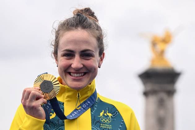 OLY24 CYCLING ROAD, Australian cyclist Grace Brown reacts after winning a gold medal during the Women s Individual Time Trial at Pont Alexandre III as part of the 2024 Paris Olympic Games, Olympische Spiele, Olympia, OS in Paris, France, Saturday, July 27, 2024. ( NO ARCHIVING, EDITORIAL USE ONLY, NO USE IN BOOKS WITHOUT CONSENT PARIS FRANCE Copyright: xJOELxCARRETTx 20240728168597048832