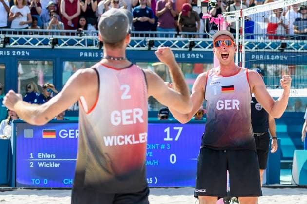 FRA, Summer Olympics Paris 2024, Beach Volleyball , Preliminary Round Group C, Match 3, Ehlers Wickler GER vs Bassereau Lyneel FRA 30 07 2024, Champ de Mars, Paris, FRA, Summer Olympics Paris 2024, Beach Volleyball , Preliminary Round Group C, Match 3, Ehlers Wickler GER vs Bassereau Lyneel FRA , pictured cheering for Wickler Clemens GER and Ehlers Nils GER nordphotoxGmbHx xStraubmeier nph00004