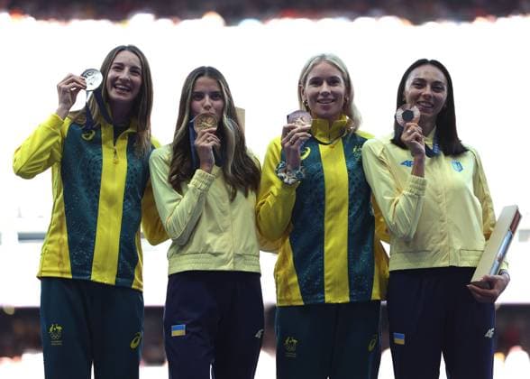 (240805) -- PARIS, Aug. 5, 2024 -- Gold medalist Yaroslava Mahuchikh (2nd L) of Ukraine, silver medalist Nicola Olyslagers (1st L) of Australia, bronze medalists Eleanor Patterson(2nd R) of Australia and Iryna Gerashchenko of Ukraine react during the victory ceremony of the women s high jump of athletics at the Paris 2024 Olympic Games, Olympische Spiele, Olympia, OS in Paris, France, Aug. 5, 2024. ) (PARIS2024) FRANCE-PARIS-OLY-ATHLETICS-HIGH JUMP-WOMEN LixYing