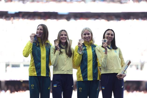 (240805) -- PARIS, Aug. 5, 2024 -- Gold medalist Yaroslava Mahuchikh (2nd L) of Ukraine, silver medalist Nicola Olyslagers (1st L) of Australia, bronze medalists Eleanor Patterson(2nd R) of Australia and Iryna Gerashchenko of Ukraine react during the victory ceremony of the women s high jump of athletics at the Paris 2024 Olympic Games, Olympische Spiele, Olympia, OS in Paris, France, Aug. 5, 2024. ) (PARIS2024) FRANCE-PARIS-OLY-ATHLETICS-HIGH JUMP-WOMEN LixYing