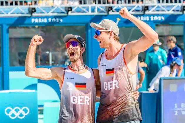 FRA, Summer Olympics Paris 2024, Beach Volleyball , Men , Quarterfinals EHLERS WICKLER GER vs BOERMANS DE GROOT 06 08 2024, Champ de Mars, Paris, FRA, Summer Olympics Paris 2024, Beach Volleyball , Men , Quarterfinals EHLERS WICKLER GER vs BOERMANS DE GROOT, pictured Nils Ehlers GER with Clemens Wickler GER celebrating their victory nordphotoxGmbHx xStraubmeier nph00004