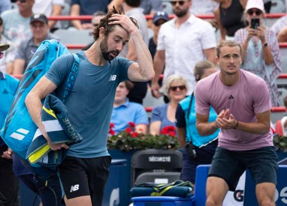 August 8, 2024, Montreal, Pq, Canada: Australia s Jordan Thompson, left, leaves the court as Germany s Alexander Zverev looks on after their second round match at the National Bank Open tennis Thursday, August 8, 2024 in Montreal. Zverev won the match in straight sets. Alexander Zverev, Jordan Thompson, - ZUMAc35_ 20240808_zaf_c35_095 Copyright: xRyanxRemiorzx