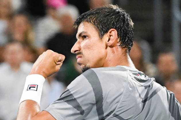 August 12, 2024, Montreal, Pq, Canada: Alexei Popyrin, of Australia, reacts following a shot to Andrey Rublev, of Russia, during the final of the National Bank Open men s tennis tournament in Montreal, Monday, August 12, 2024. Alexei Popyrin, Andrey Rublev, - ZUMAc35_ 20240812_zaf_c35_107 Copyright: xGrahamxHughesx
